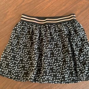 Girls skirt, size 8. Black with white stars.
